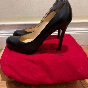 Black Louboutins (red bottoms)